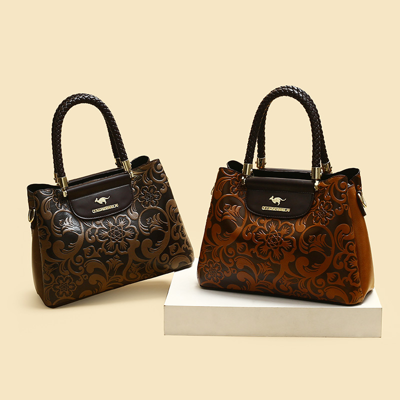 真皮质感手提包女包2025新款复古雕花大容量妈妈包单肩斜挎包