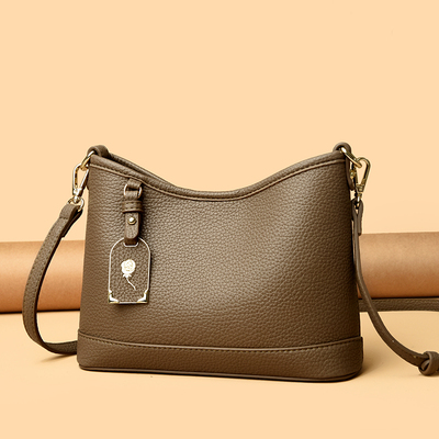 品牌真皮质感女包2025新款大容量腋下水桶包百搭通勤单肩斜挎小包