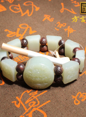 新疆且末老料白玉俏雕龙牌佛手串