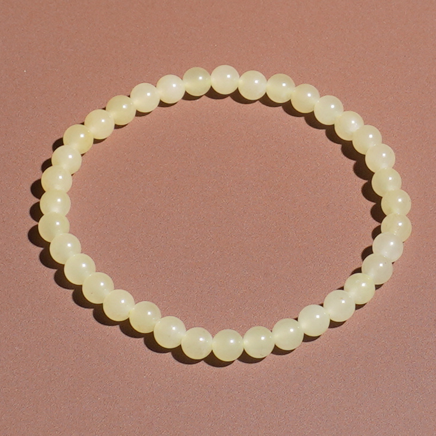 和田玉且末冰底温润鸡油黄口手串