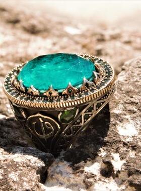 帕拉伊巴宝石镶嵌碧玺雕刻戒指