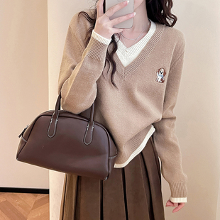 唐狮2026秋冬毛衣女卡通图案设计感假两件V领套头慵懒风高级感潮