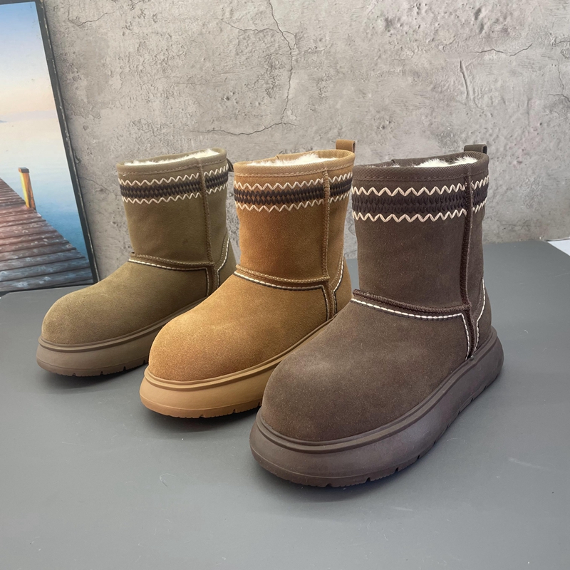 2025新款撤柜断码处理冬季真皮厚底套筒加绒加厚雪地大头女棉短靴