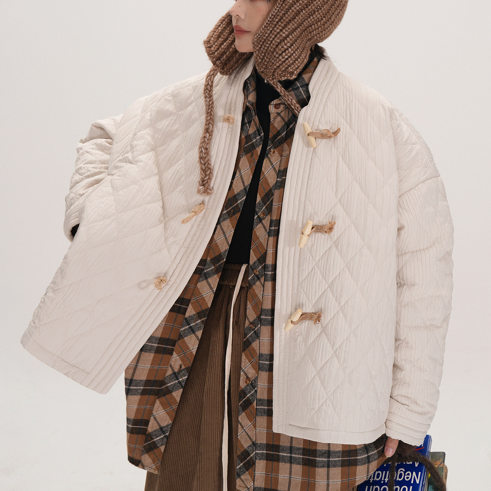 谭烟米菱格纹棉服宽松牛角扣