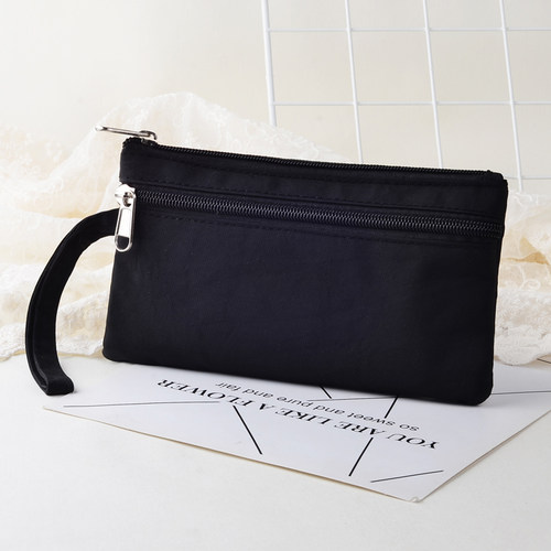 手拿包女新款简约布包便携小包