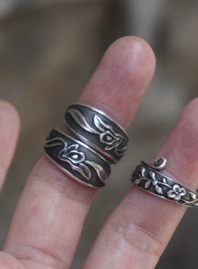 云起收藏。清代花卉精工厚实双尖卷须单尖老银戒指卷戒