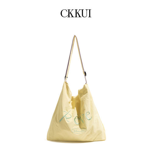 CKKUI假日出游日光黄帆布包包