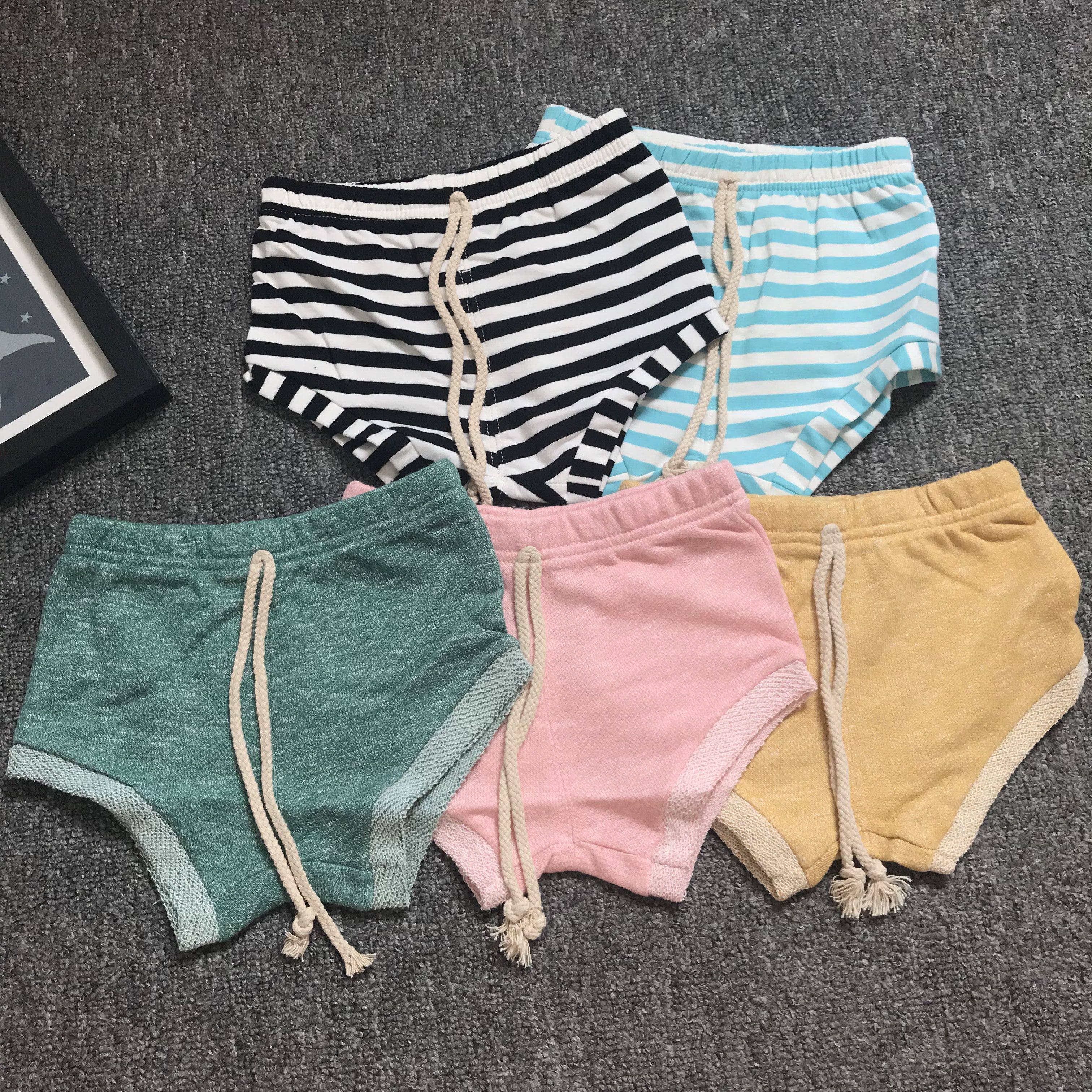 宝宝黑条纹短裤夏季男童Q7开档雪花粉面包裤欧美纯棉女孩沙滩热裤