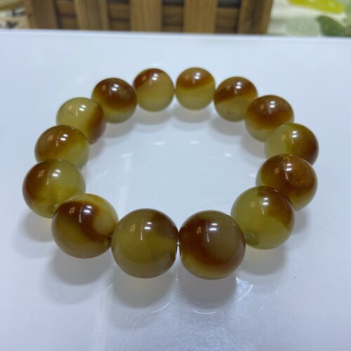 岫玉俏色巧雕花玉卡16手串