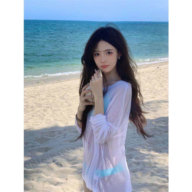 白色微透长袖防晒空调罩衫女夏季薄款性感辣妹海边外搭针织衫上衣