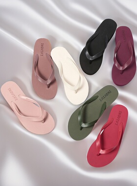 新款人字拖鞋女黑色中跟坡跟人字拖沙滩拖夹趾女拖鞋防滑底可下水