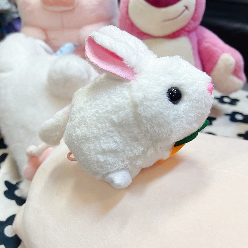 拉绳兔子摇尾巴仿真毛绒玩具拉绳线摇摆转发条六一礼物玩具