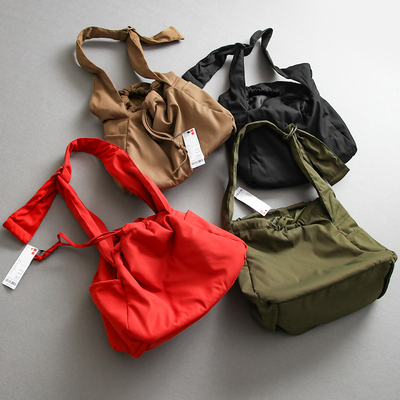 春夏新款休闲大容量抽绳斜挎大包