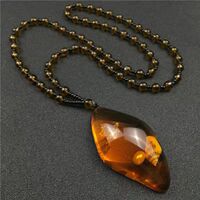 Imitation Brazilian plant fossil sweater chain, imitation amber and beeswax water drop peace pendant, ethnic scenic area necklace thumbnail 5