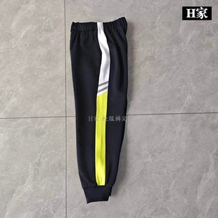 订做乌鲁木齐第七十小学深蓝校服运动裤子侧边白拼黄绿色加反光条