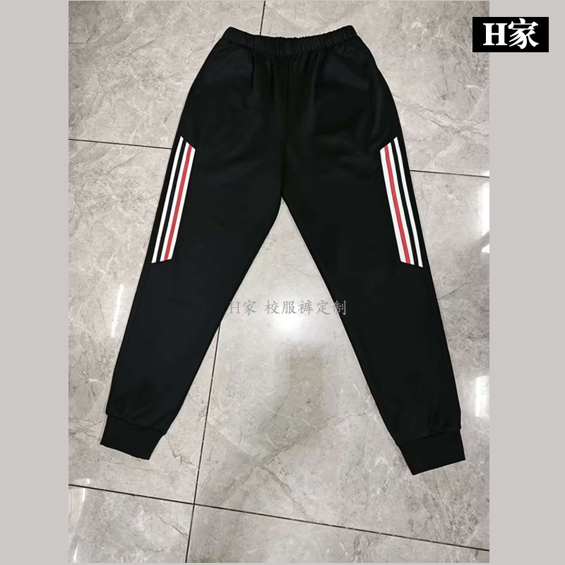 订做六安舒城县藏青色四季校服运动裤子侧拼白条镶红蓝条束口加绒