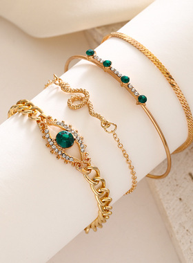 跨境饰品时尚小众镶钻绿眼宝石手链套装个性蛇形开口手镯四件套女