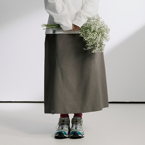 SOMENUM森林 24AW 山系户外女机能弧线拼接松紧腰半身中长款A字裙