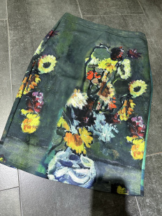 绿色印花包臀中短半身裙