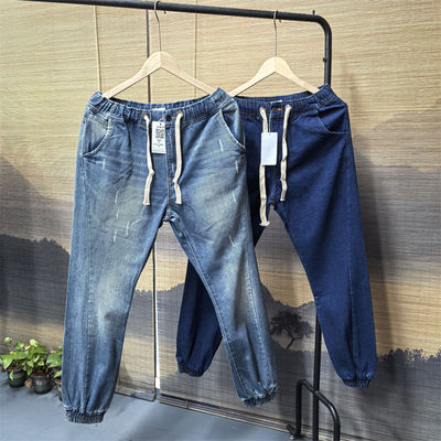 春季潮流水洗磨白束脚牛仔裤