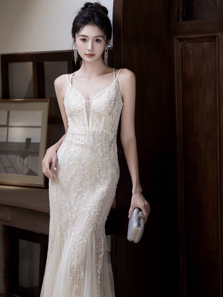 香槟色晚礼服女2026新款高级感气质绝美主持人一字肩鱼尾亮片长裙