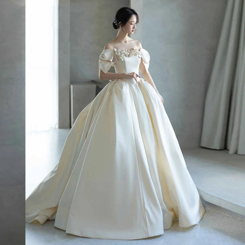 缎面主婚纱2025新款新娘法式一字肩蝴蝶结小个子订婚礼服大拖尾女