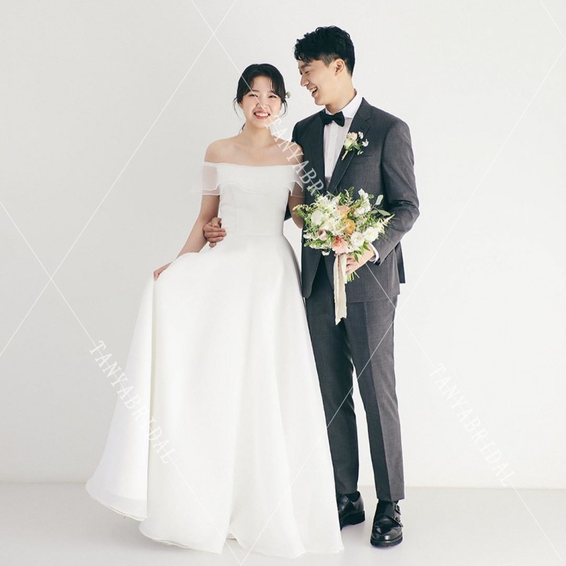 一字肩简约轻婚纱2025新款草坪森系婚礼超仙旅拍齐地迎宾出门礼服
