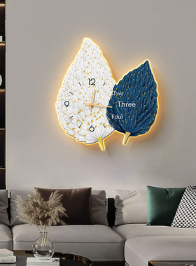 现代轻奢创意挂钟客厅抽象羽毛钟表挂墙LED壁灯高级感时钟装饰画
