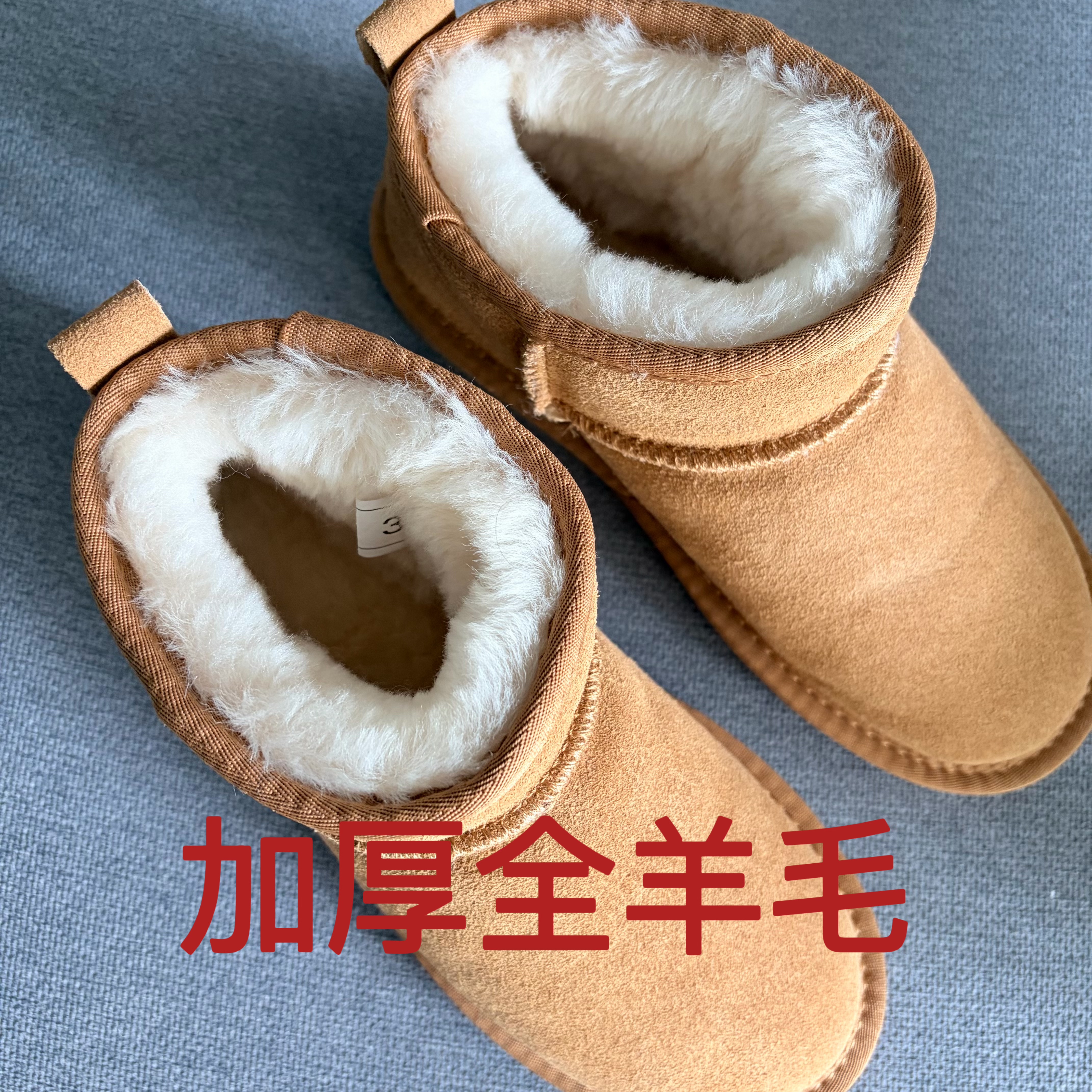 周冬雨皮毛一体同款雪地靴女短筒平底冬季全羊毛真皮太阳花防滑底