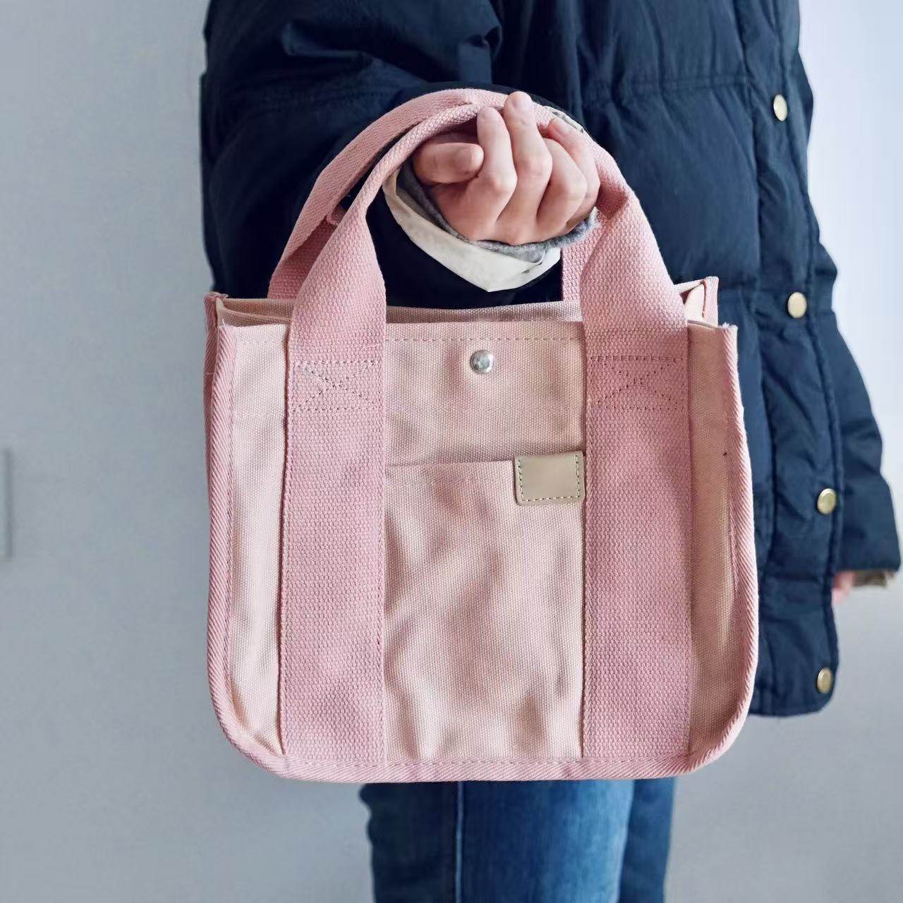 日韩风帆布托特包女手提包简约百搭便当包通勤手腕包粉色