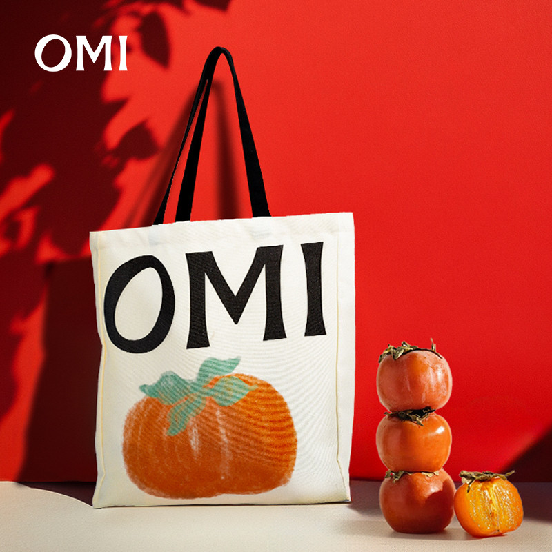 专柜发货 OMI欧米箱包OMI箱包新款柿柿如意时尚印花帆布袋单肩包