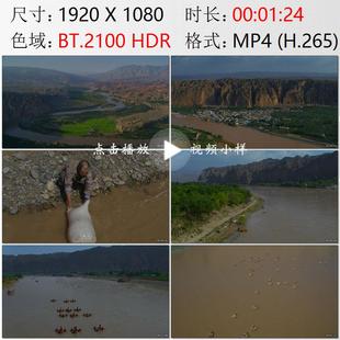 航拍甘肃黄河环抱龙湾村羊皮筏子黄河交通工具旅游开发视频素材