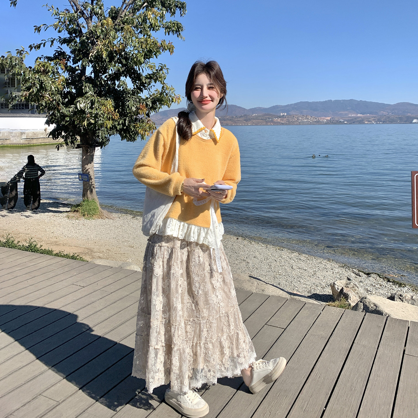 蝴蝶结拼接黄色针织衫套装女春季2026新款甜美氛围感半身裙两件套
