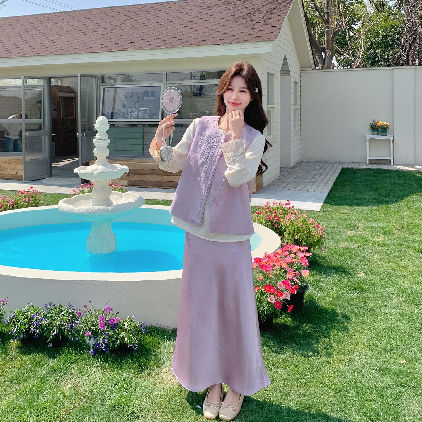 漂亮紫色马甲打底衫半身裙套装女