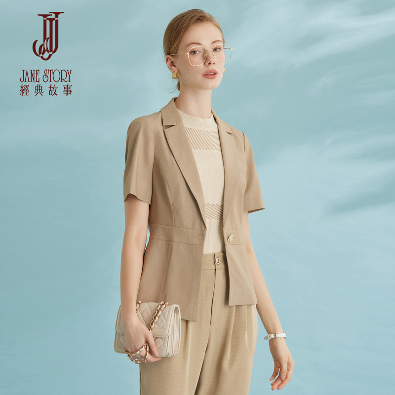 经典故事设计感小西装外套女夏季2026新款别致不规则下摆西服上衣