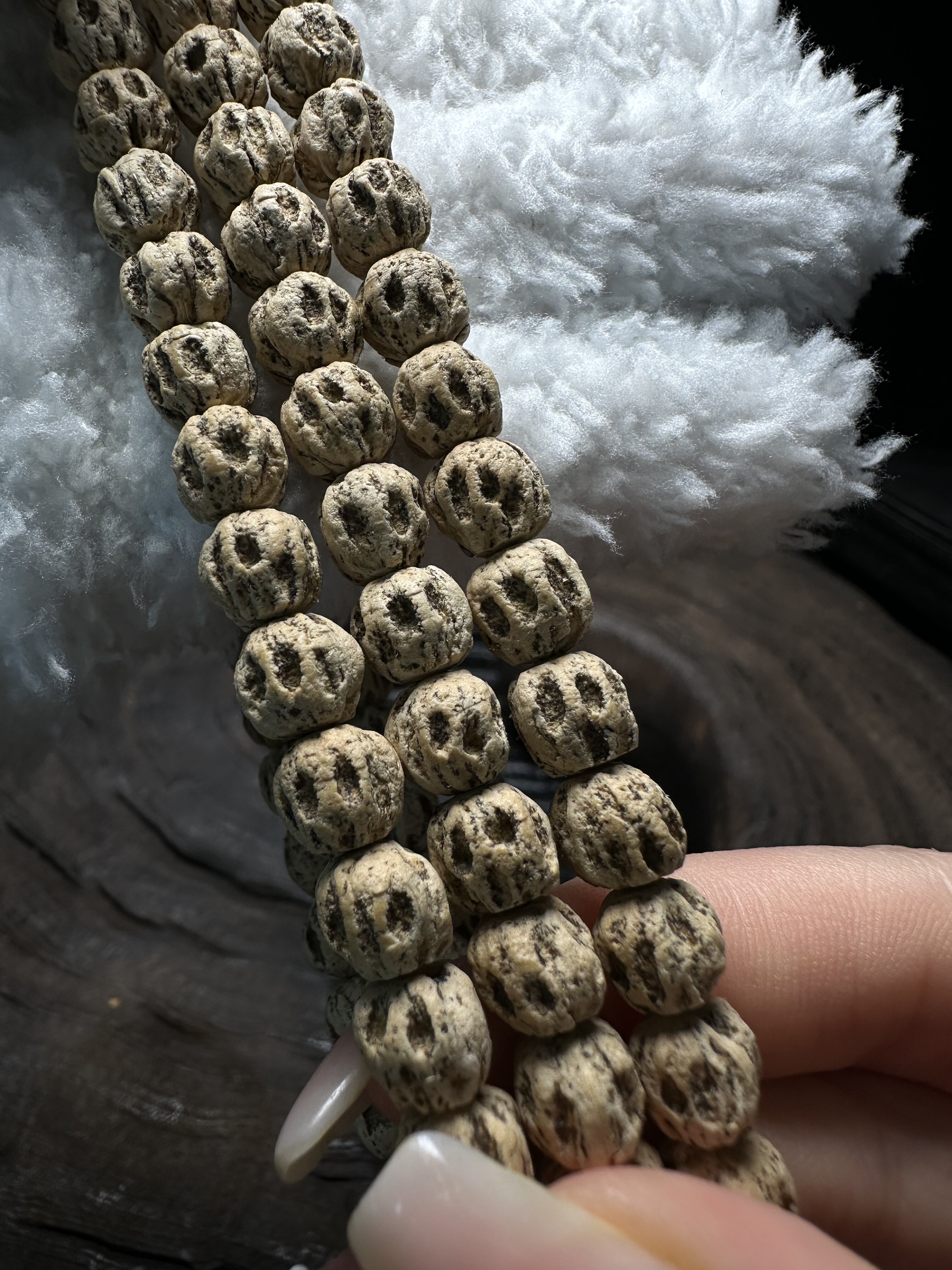 热振百香籽微切尸陀林莲花桩高密顺纹深坑麻皮文玩长串带小眼睛