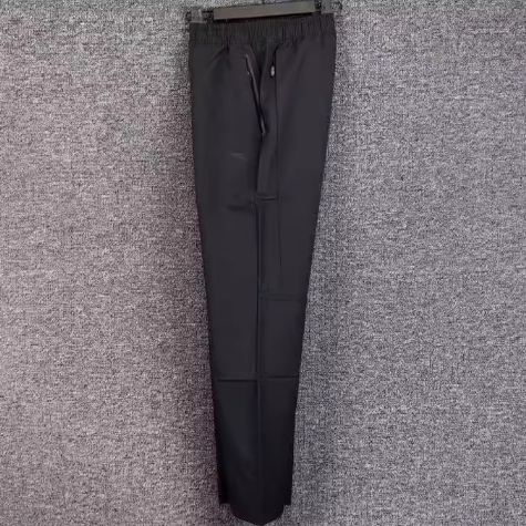 安踏正品男裤2025春新款综训时尚收口休闲梭织运动长裤152517519S