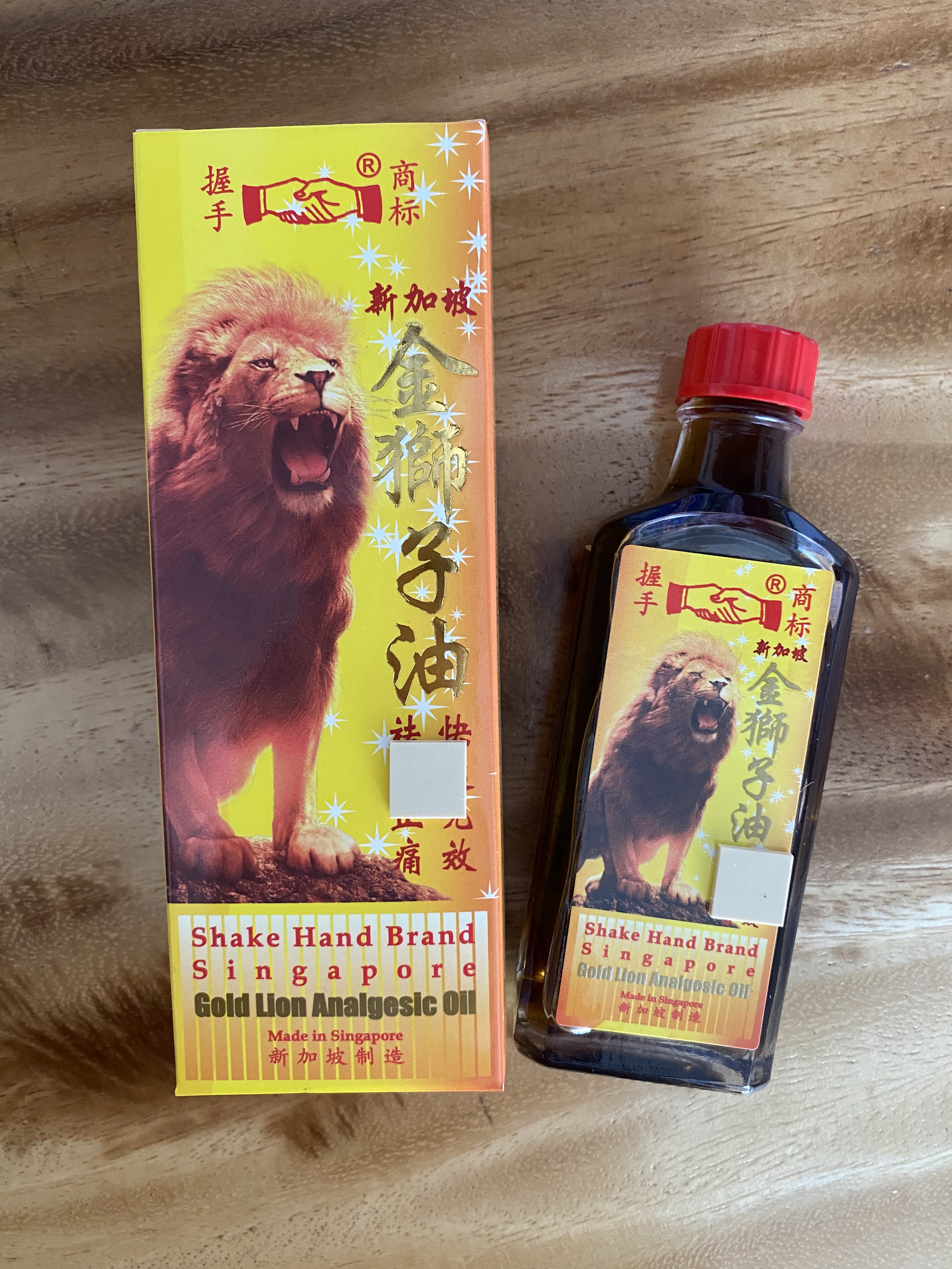 新加坡正品 华安握手牌金狮子油  包邮,洗护清洁剂/卫生巾/纸/香薰,清凉油/防暑/醒神药油,淘宝优惠券,粉丝福利购,淘宝优惠卷