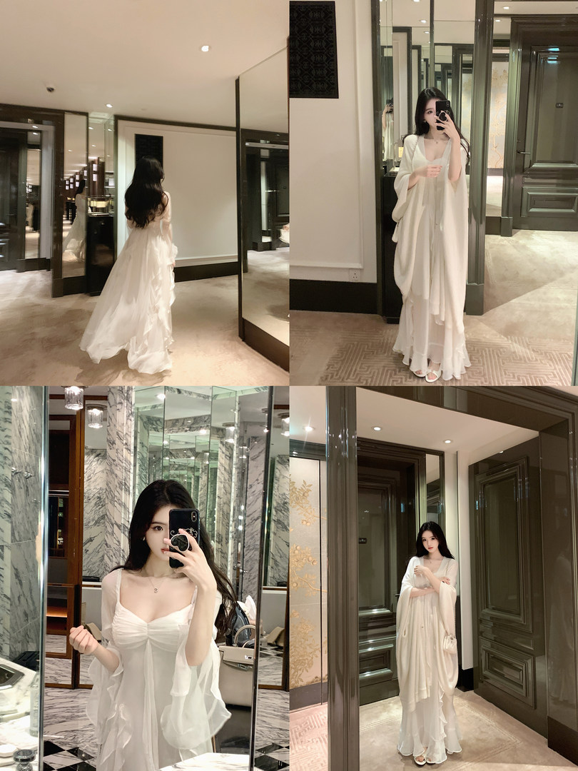 A woman wearing a white flowing dress in various mirror selfies.