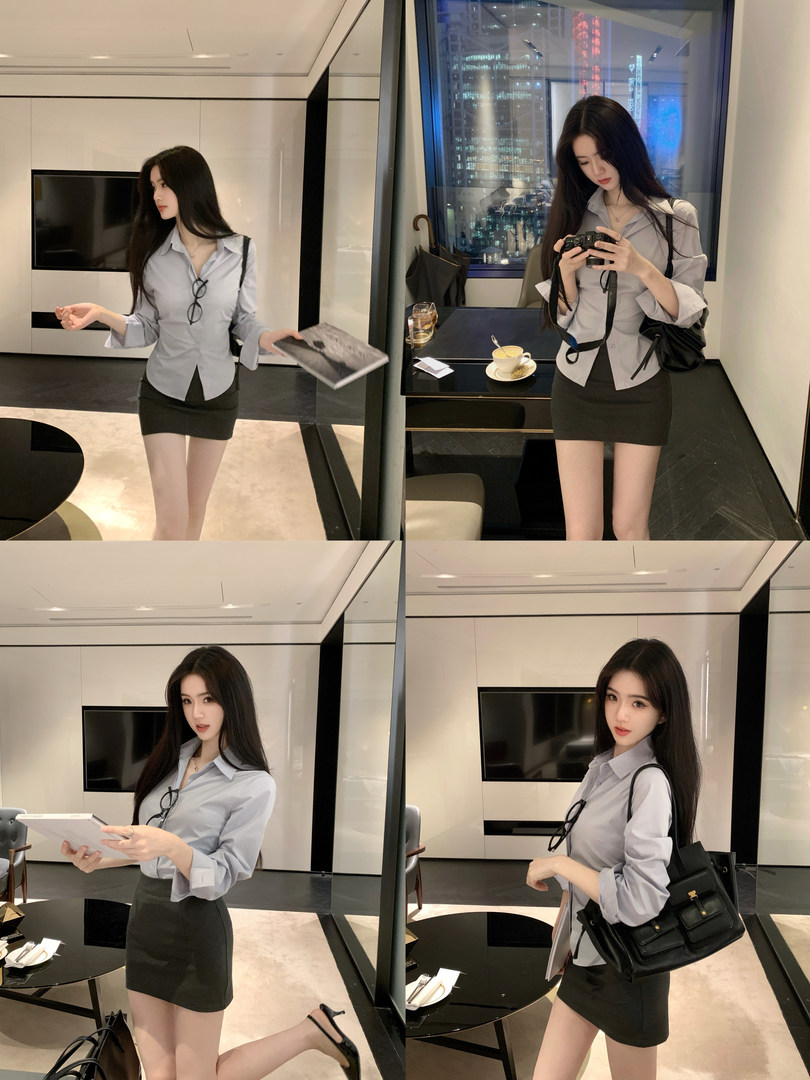 Woman modeling a light blue button-up shirt and black mini skirt in a modern interior setting