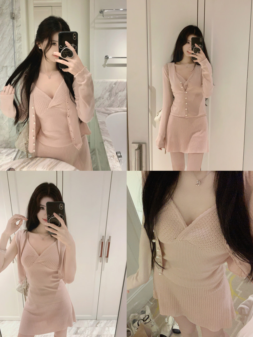 Woman taking mirror selfies wearing a light pink ribbed knit two-piece set with a cardigan and matching skirt.