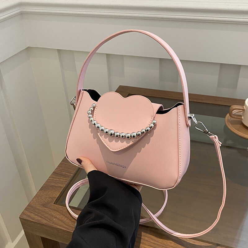 小众设计甜美爱心手拎包麦瑞雅