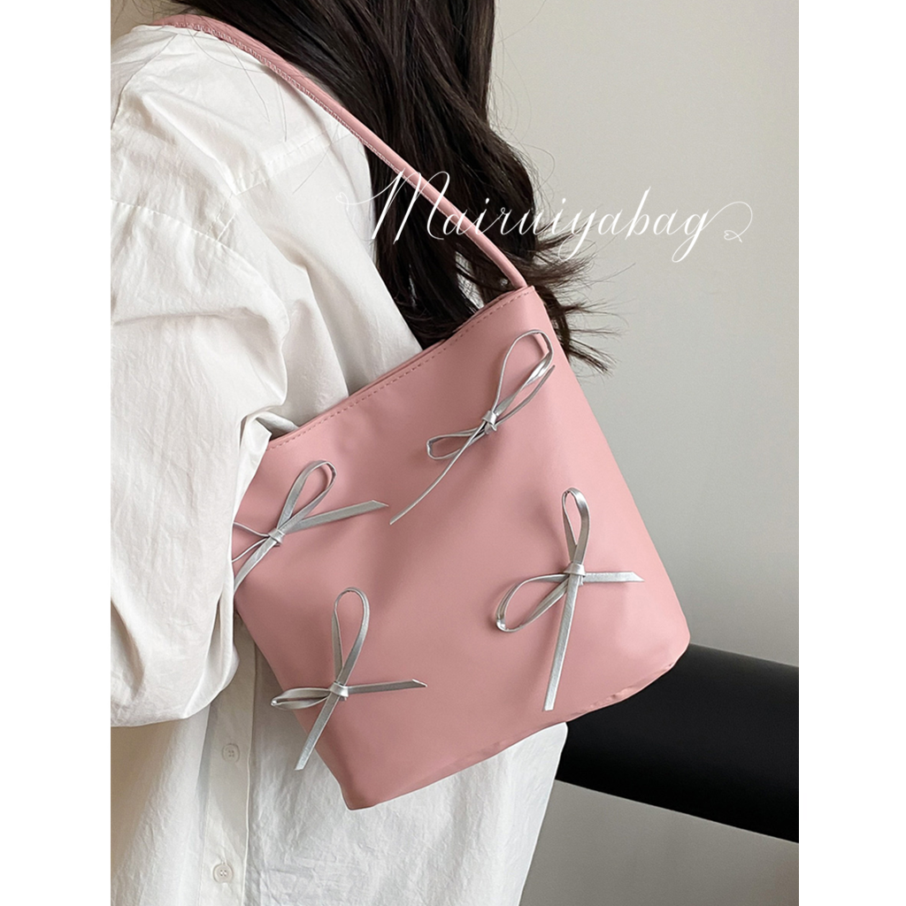 芭蕾风小众法棍斜挎通勤水桶包