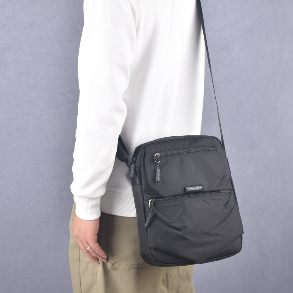 新款男士斜挎包牛津布单肩包通勤轻便商务休闲大容量多口袋小背包