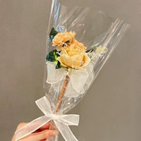 Шампанское розовое перо с бантиками с луками