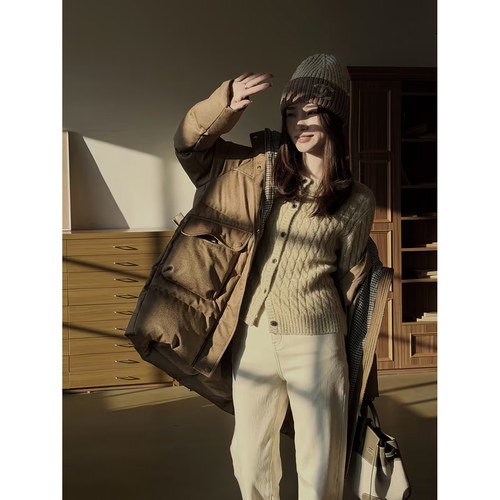 邱莹莹 HELA AOMI“水光鹅绒.千鸟格”防钻绒工艺羽绒服