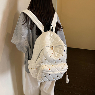 日系潮牌菱格纹彩钻铆钉双肩包女学生百搭流苏实用通勤背包THRASH