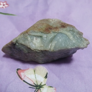 缅甸天然翡翠木那场口飘淡蓝花细腻糯化种600克牌子挂件料原石