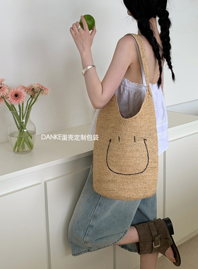 拉菲草可爱笑脸手工刺绣水桶编织包大容量韩版休闲度假单肩草编包