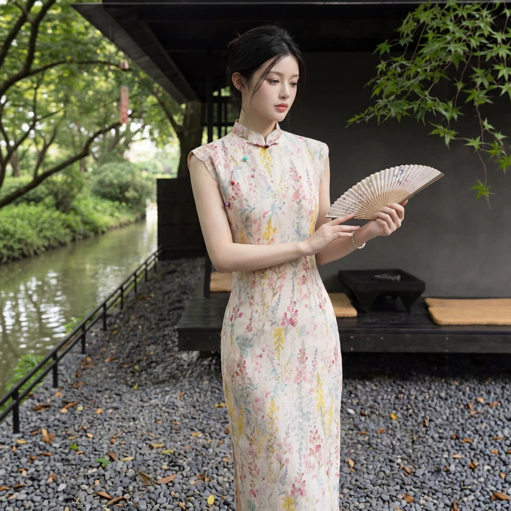 贝之韵黄色波领竹节麻印花夏长款旗袍女2026夏新款少女无袖年轻款